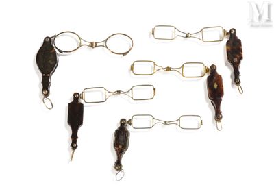 five different types of fishing lures on a white surface