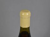 a bottle of wine that is sitting on a table