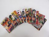a bunch of comic books sitting on top of a white table