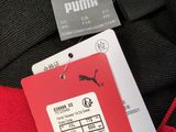 a tag on the back of a red jacket