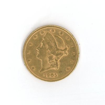 an image of a gold coin on a white surface