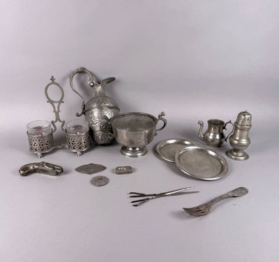 a lot of silver items that are on the table