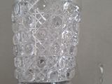 a glass of water that is sitting on a table
