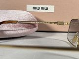 glasses are sitting on a pink cushion next to a pink case