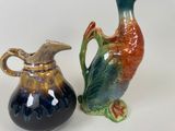 two vases sitting next to each other on a table