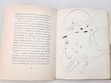 an open book with a drawing of a woman in a hat on it