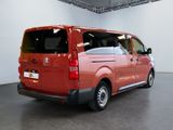 a red van that is parked inside of a building