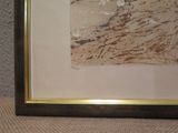 a picture of a picture of a man riding a horse on the beach