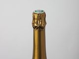 a bottle of wine that is sitting on a table