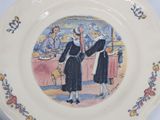 a picture of a plate with a picture of two women on it