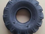 a close up of a tire on a wall