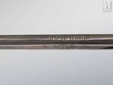 a close up of a baseball bat on a white surface