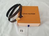 Ceinture en cuir Louis Vuitton avec boucle dorée