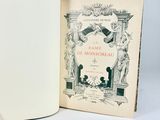 an open book with a picture of a statue on it