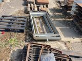 a lot of old wooden crates and other items on the ground