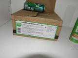 a box of soda and a can of soda on a counter