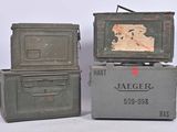 three military boxes are stacked on top of each other on a white surface