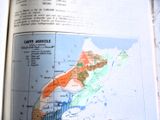 un livre ouvert sur lequel figure une carte du Mexique