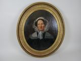 portrait of a woman in a black dress with a white bonnet