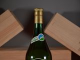 a bottle of wine that is sitting on a table