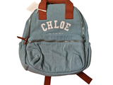 a blue backpack that has a name on it