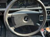 dashboard of a car with a steering wheel and dashboard controls