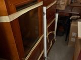 a fireplace in the middle of a room with boxes on the floor