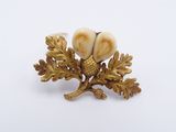 gold plated brooch with acorns and acorns on a branch
