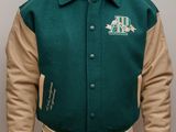 this image may contain an image of a man wearing a green jacket