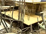 a lot of chairs and tables in a room