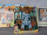 two boxes of toys that are sitting on a table