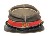 a brown hat with a red ribbon around it