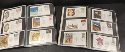 a lot of stamps in a folder on the table