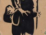 a sticker on a cardboard box with a drawing of a person holding a scyther