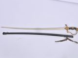 a knife and a pair of scissors sitting on a table