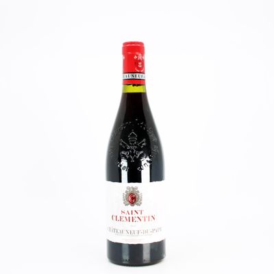 a bottle of wine that is sitting on a table
