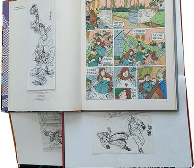 un livre ouvert sur lequel figure l'image d'un personnage de bande dessinée