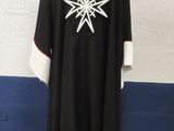 a black and white robe with a snowflake design on it