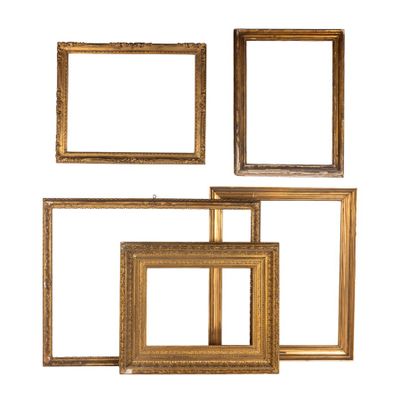 a set of four gold picture frames on a white background