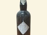 a bottle of wine that is sitting on a table