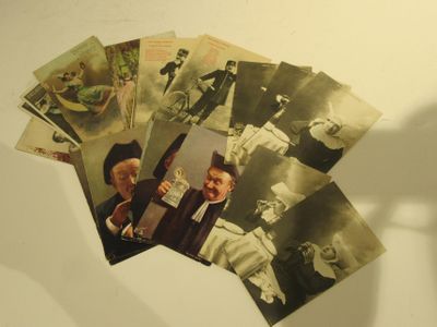 a bunch of old photos that are on a table