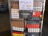 a metal cart with a sign on it in a warehouse