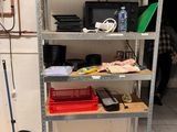 a shelf that has a bunch of items on it
