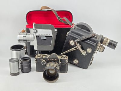 a lot of different types of cameras in this picture