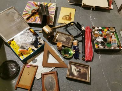 a pile of assorted items sitting on a table
