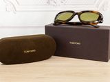 tom ford tortoise sunglasses in box and case on table