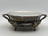an antique silverplated bowl with handles and handles on a stand