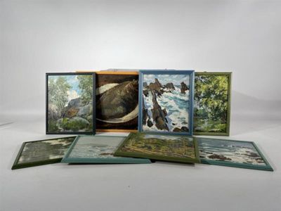 an image of a collection of paintings of elephants in a wooden box