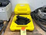 a yellow case with a black handle and a yellow case with a black handle