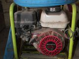 a small engine that is sitting on a stand